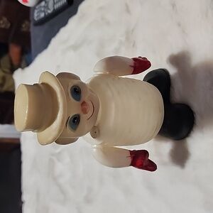 VINTAGE  SQUEAKER MAN TOY.
